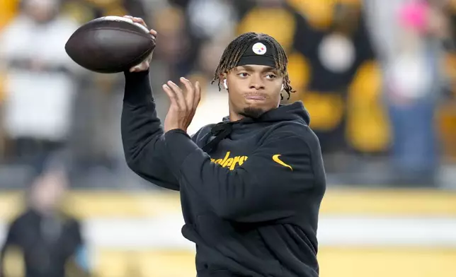 Pittsburgh Steelers quarterback Justin Fields warms up before an NFL football game against the New York Giants, Monday, Oct. 28, 2024, in Pittsburgh. (AP Photo/Gene J. Puskar)