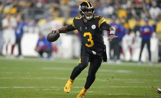 Pittsburgh Steelers quarterback Russell Wilson (3) throws during the first half of an NFL football game against the New York Giants, Monday, Oct. 28, 2024, in Pittsburgh. (AP Photo/Gene J. Puskar)