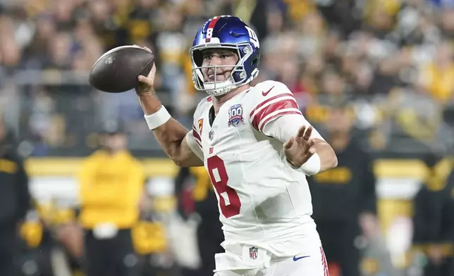 New York Giants quarterback Daniel Jones (8) throws a pass during the first half of an NFL football game against the Pittsburgh Steelers, Monday, Oct. 28, 2024, in Pittsburgh. (AP Photo/Matt Freed)