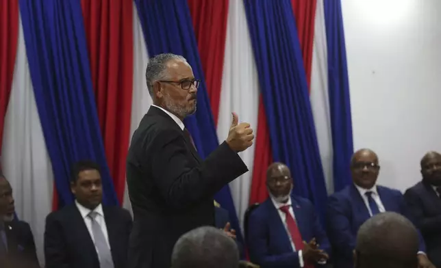 Haiti's new Prime Minister Alix Didier Fils-Aimé reacts after his inauguration ceremony in Port-au-Prince, Haiti, Monday, Nov. 11, 2024. (AP Photo/Odelyn Joseph)