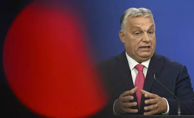 Hungary's Prime Minister Viktor Orban speaks during a press conference during the European Political Community (EPC) Summit at the Puskas Arena in Budapest , Hungary, Thursday, Nov. 7, 2024. (AP Photo/Denes Erdos)