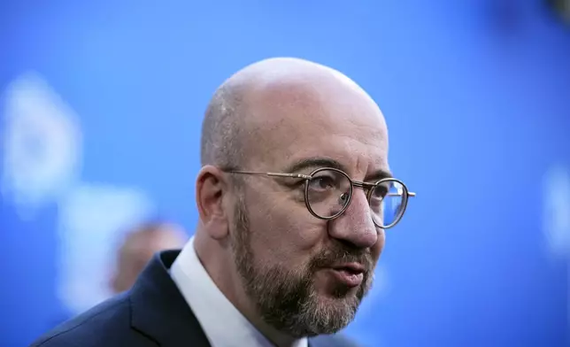 European Council President Charles Michel speaks with the media as he arrives for the European Political Community (EPC) Summit at the Puskas Arena in Budapest, Hungary, Thursday, Nov. 7, 2024. (AP Photo/Petr Josek)