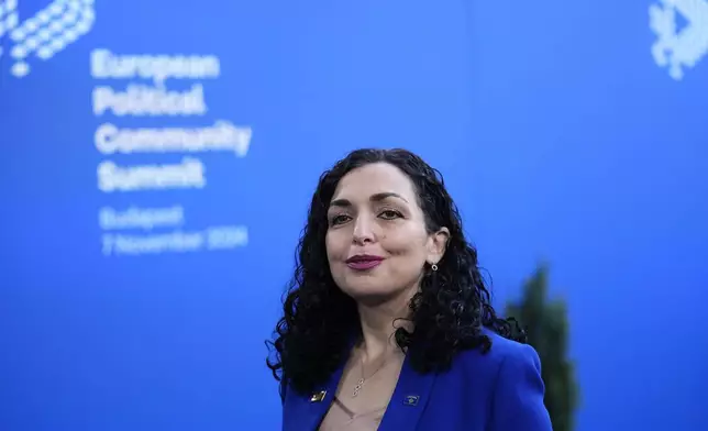 Kosovo's President Vjosa Osmani arrives for the European Political Community (EPC) Summit at the Puskas Arena in Budapest, Hungary, Thursday, Nov. 7, 2024. (AP Photo/Petr Josek)