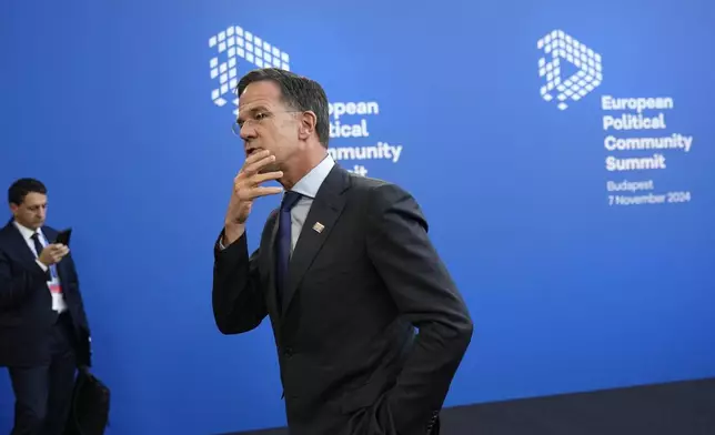 NATO Secretary General Mark Rutte arrives for the European Political Community (EPC) Summit at the Puskas Arena in Budapest, Hungary, Thursday, Nov. 7, 2024. (AP Photo/Petr Josek)