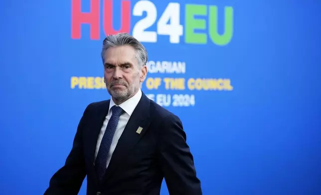 Netherland's Prime Minister Dick Schoof arrives for an EU Summit at the Puskas Arena in Budapest, Hungary, Friday, Nov. 8, 2024. (AP Photo/Petr David Josek)