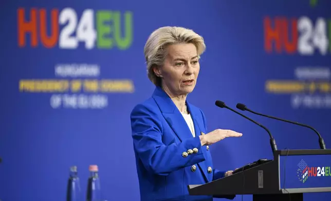 European Commission President Ursula von der Leyen addresses a media conference at the end of an EU Summit at the Puskas Arena in Budapest, Friday, Nov. 8, 2024. (AP Photo/Denes Erdos)