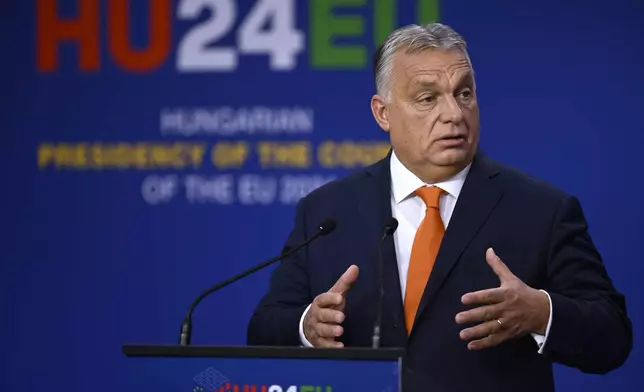 Hungary's Prime Minister Viktor Orban addresses a media conference at the end of an EU Summit at the Puskas Arena in Budapest, Friday, Nov. 8, 2024. (AP Photo/Denes Erdos)