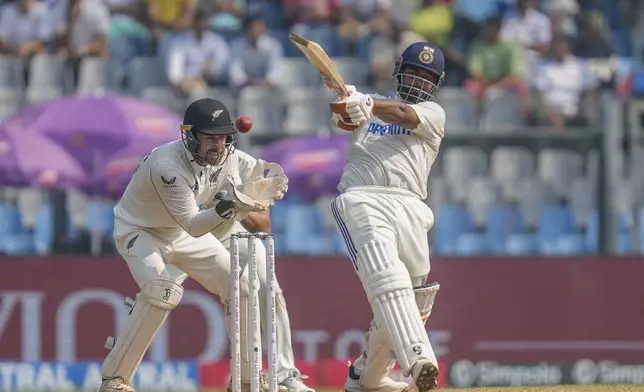 India's Rishab Pant plays a shot during the second day of the third cricket test match between India and New Zealand at Wankhede Stadium, in Mumbai, India, Saturday, Nov. 2, 2024.(AP Photo/Rajanish Kakade)