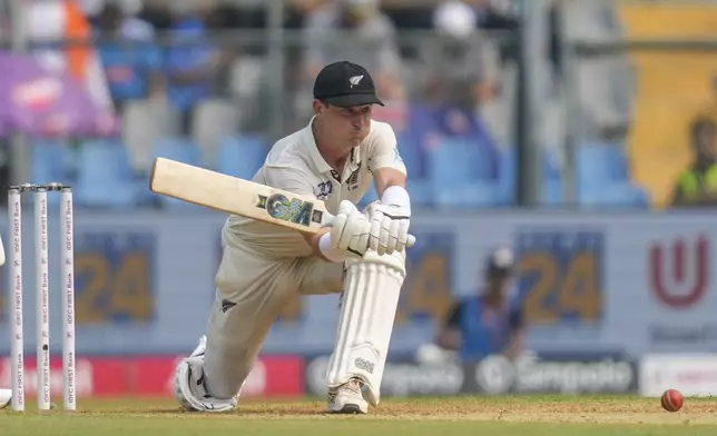 New Zealand's Will Young bats during the first day of the third cricket test match between India and New Zealand at Wankhede Stadium, in Mumbai, India, Friday, Nov. 1, 2024.(AP Photo/Rajanish Kakade)