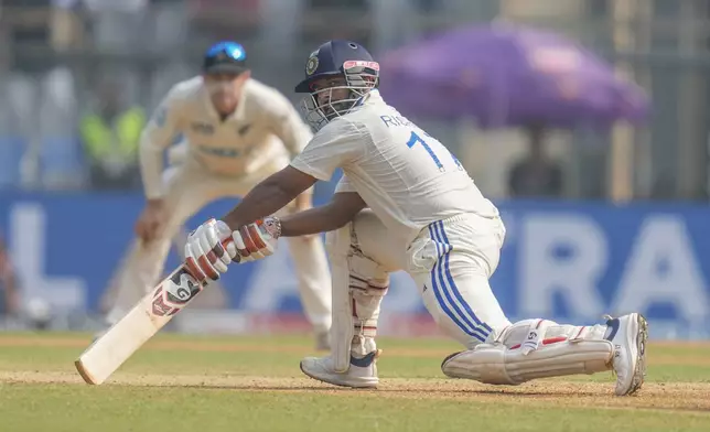 India's Rishab Pant plays a shot during the second day of the third cricket test match between India and New Zealand at Wankhede Stadium, in Mumbai, India, Saturday, Nov. 2, 2024.(AP Photo/Rajanish Kakade)