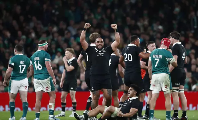 New Zealand's Ofa Tu'ungafasi, celebrates at th end of the Autumn Nations series rugby union match between Ireland and New Zealand at the Aviva Stadium in Dublin, Ireland, Friday, Nov. 8, 2024, New Zealand won the game 23-13. (AP Photo/Peter Morrison)