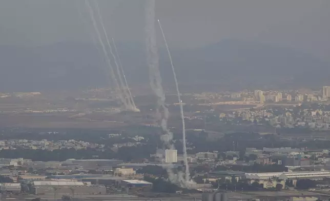 Israeli Iron Dome air defense system fires to intercept rockets that were launched from Lebanon, as seen from Haifa, northern Israel, on Monday, Nov. 11, 2024. (AP Photo/Francisco Seco)