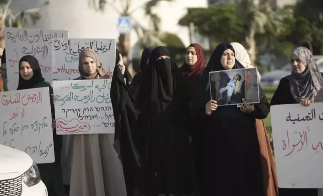 Palestinian citizens of Israel protest against Israel's military operations in the Gaza Strip and Lebanon, in Umm Al-Fahm, Israel, Saturday, Nov. 9, 2024. (AP Photo/Mahmoud Illean)