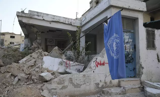 The office of the United Nations for helping Palestinian refugees, UNRWA, that was partly demolished during the Israeli army operation in the West Bank refugee camp of Nur Shams, in Tulkarem Thursday, Oct. 31, 2024. (AP Photo/Nasser Nasser)