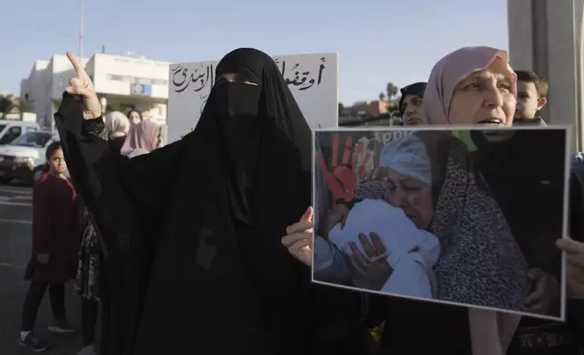 Palestinian citizens of Israel protest against Israel's military operations in the Gaza Strip and Lebanon, in Umm Al-Fahm, Israel, Saturday, Nov. 9, 2024. (AP Photo/Mahmoud Illean)