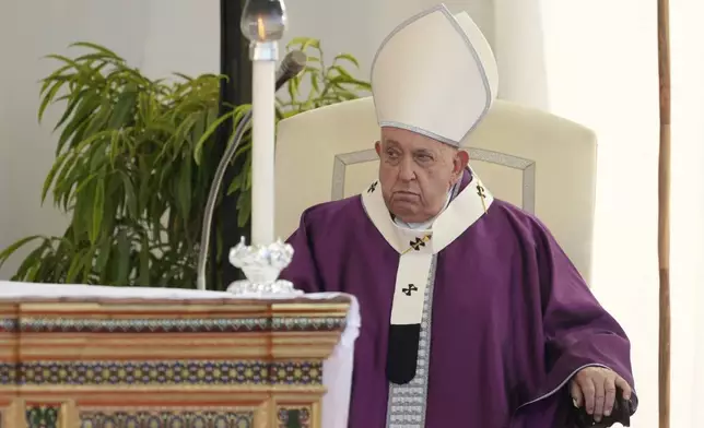 Pope Francis presides over a ceremony on the occasion of All Souls Day, at the Laurentino cemetery in the outskirts of Rome, Saturday, Nov. 2, 2024. (AP Photo/Andrew Medichini)