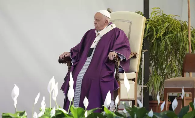 Pope Francis presides over a ceremony on the occasion of All Souls Day, at the Laurentino cemetery in the outskirts of Rome, Saturday, Nov. 2, 2024. (AP Photo/Andrew Medichini)