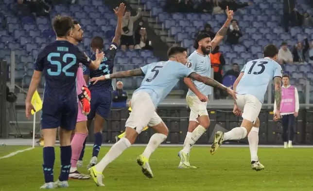 Lazio players celebrate after a goal during the Europa League soccer match between Lazio and Porto at Rome's Olympic Stadium on Thursday, Nov. 7, 2024. (AP Photo/Gregorio Borgia)