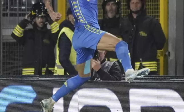 Empoli's Pietro Pellegri celebrates after scoring his team's first goal, during the Serie A soccer match between Empoli and Como, at the "Carlo Castellani - Computer Gross Arena" stadium in Empoli, Italy, Monday , Nov. 4, 2024. (Marco Bucco/LaPresse via AP)