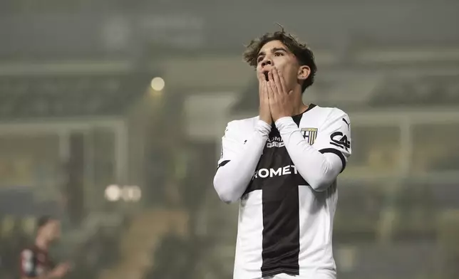 Parma's Anas Haj Mohamed reacts during the Serie A match between Parma and Genoa at the Ennio Tardini Stadium in Parma, Italy, Monday Nov. 4, 2024. (Massimo Paolone/LaPresse via AP)