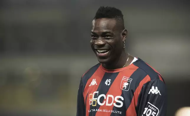 Genoa's Mario Balotelli looks on during Genoa warm up during the Serie A soccer match between Parma and Genoa at Ennio Tardini Stadium in Parma, Italy, Monday, Nov. 4, 2024. (Massimo Paolone/LaPresse via AP)