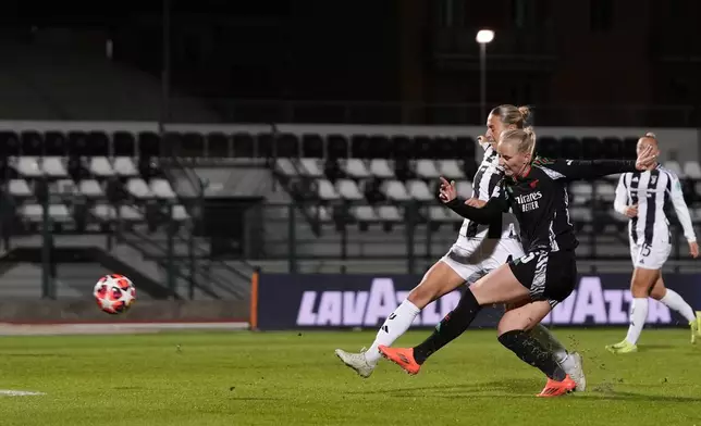 Arsenal's Stina Blackstenius scores her side's second goal during the women's Champions League soccer match between Juventus and Arsenal at the Vittorio Pozzo La Marmora Stadium in Biella, Italy, Tuesday, Nov. 12, 2024. (Fabio Ferrari/LaPresse via AP)