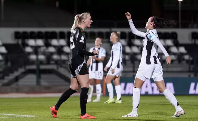 Arsenal's Stina Blackstenius, left, celebrates scoring her side's second goal during the women's Champions League soccer match between Juventus and Arsenal at the Vittorio Pozzo La Marmora Stadium in Biella, Italy, Tuesday, Nov. 12, 2024. (Fabio Ferrari/LaPresse via AP)