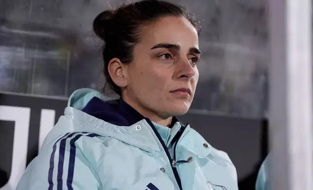 Arsenal head coach Renée Slegers sits on the bench ahead of the women's Champions League soccer match between Juventus and Arsenal at the Vittorio Pozzo La Marmora Stadium in Biella, Italy, Tuesday, Nov. 12, 2024. (Fabio Ferrari/LaPresse via AP)