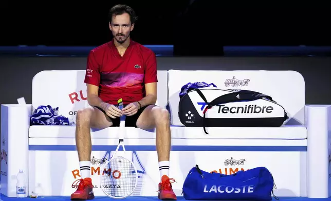 Daniil Medvedev looks on during a break in the singles tennis match of the ATP World Tour Finals against Taylor Fritz, of the United States, at the Pala Alpitour, in Turin, Italy, Sunday, Nov. 10, 2024. (Marco Alpozzi/LaPresse via AP)