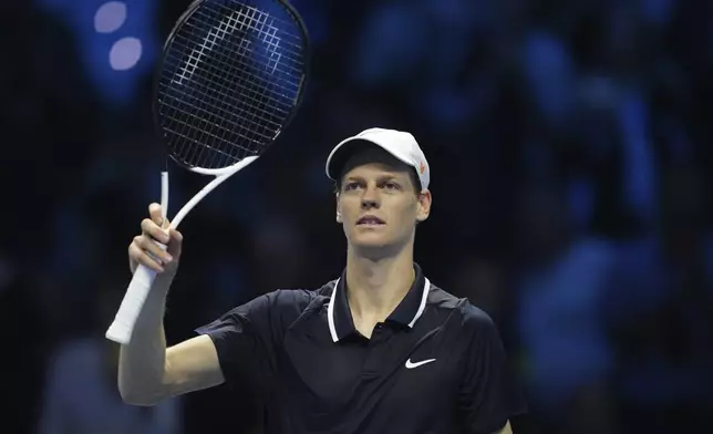 Italy's Jannik Sinner celebrates after winning the singles tennis match of the ATP World Tour Finals against Australia's Alex de Minaur, at the Inalpi Arena, in Turin, Italy, Sunday, Nov. 10, 2024. (AP Photo/Antonio Calanni)