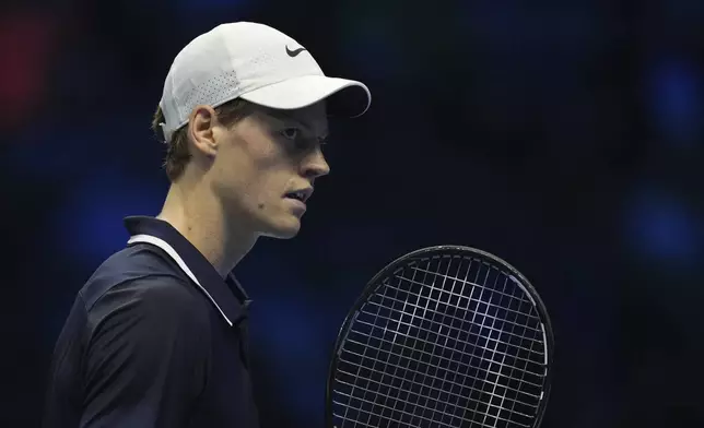 Italy's Jannik Sinner reacts during the singles tennis match of the ATP World Tour Finals against Australia's Alex de Minaur, at the Inalpi Arena, in Turin, Italy, Sunday, Nov. 10, 2024. (AP Photo/Antonio Calanni)