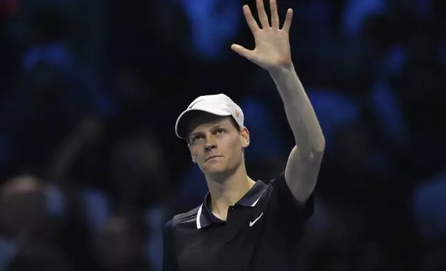 Italy's Jannik Sinner celebrates after winning the singles tennis match of the ATP World Tour Finals against United States' Taylor Fritz, at the Inalpi Arena, in Turin, Italy, Tuesday, Nov. 12, 2024. (AP Photo/Antonio Calanni)