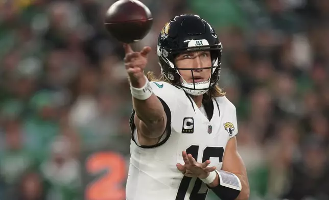 Jacksonville Jaguars quarterback Trevor Lawrence passes during the first half of an NFL football game against the Philadelphia Eagles on Sunday, Nov. 3, 2024, in Philadelphia. (AP Photo/Matt Slocum)