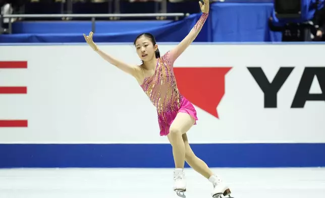 Mone Chiba of Japan competes in the women's short program at the Grand Prix of Figure Skating series competition in Tokyo, Japan, Friday, Nov. 8, 2024. (AP Photo/Hiro Komae)