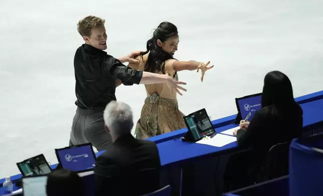 Madison Chock and Evan Bates of the U.S. compete in the ice dance free dance at the Grand Prix of Figure Skating series competition in Tokyo, Saturday, Nov. 9, 2024. (AP Photo/Hiro Komae)