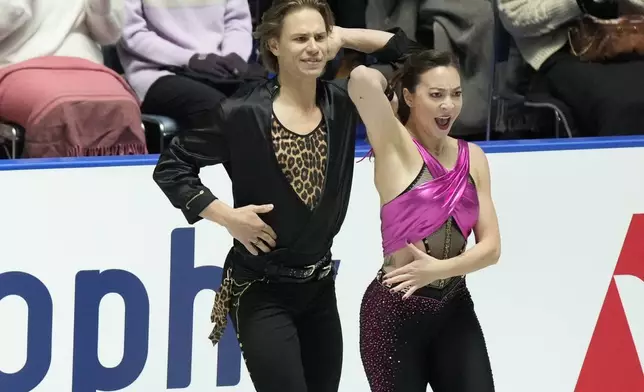 Allison Reed and Saulius Ambrulevicius of Lithuania compete in the ice dance rhythm dance program at the Grand Prix of Figure Skating series competition in Tokyo, Japan, Friday, Nov. 8, 2024. (AP Photo/Hiro Komae)