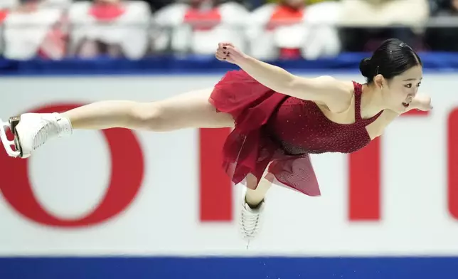 Yuna Aoki of Japan competes in the women's short program at the Grand Prix of Figure Skating series competition in Tokyo, Japan, Friday, Nov. 8, 2024. (AP Photo/Hiro Komae)