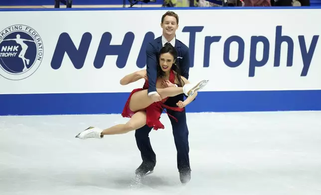 Madison Chock and Evan Bates of the U.S. compete in the ice dance rhythm dance program at the Grand Prix of Figure Skating series competition in Tokyo, Japan, Friday, Nov. 8, 2024. (AP Photo/Hiro Komae)