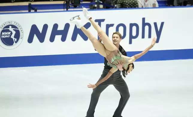 Madison Chock and Evan Bates of the U.S. compete in the ice dance free dance at the Grand Prix of Figure Skating series competition in Tokyo, Saturday, Nov. 9, 2024. (AP Photo/Hiro Komae)