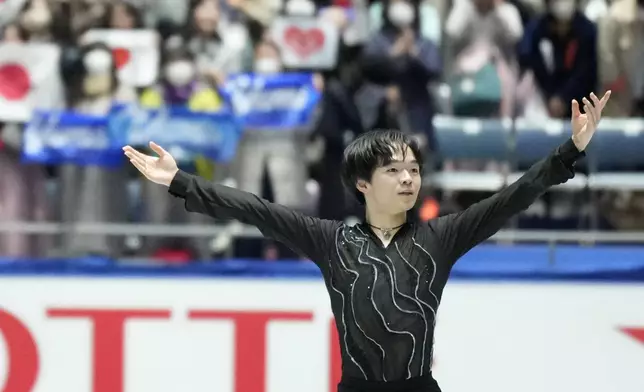 Yuma Kagiyama of Japan reacts after competing in the men's short program at the Grand Prix of Figure Skating series competition in Tokyo, Japan, Friday, Nov. 8, 2024. (AP Photo/Hiro Komae)