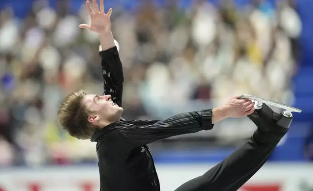 Andrew Torgashev of the U.S. competes in the men's short program at the Grand Prix of Figure Skating series competition in Tokyo, Japan, Friday, Nov. 8, 2024. (AP Photo/Hiro Komae)