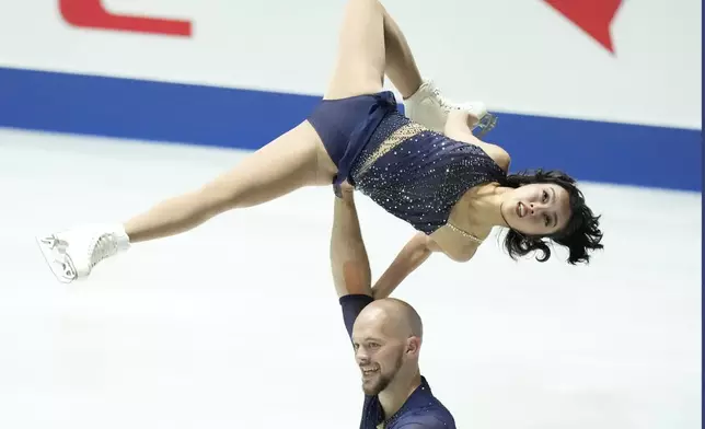 Ellie Kam and Danny O'Shea of the U.S. compete in the pairs short program at the Grand Prix of Figure Skating series competition in Tokyo, Japan, Friday, Nov. 8, 2024. (AP Photo/Hiro Komae)