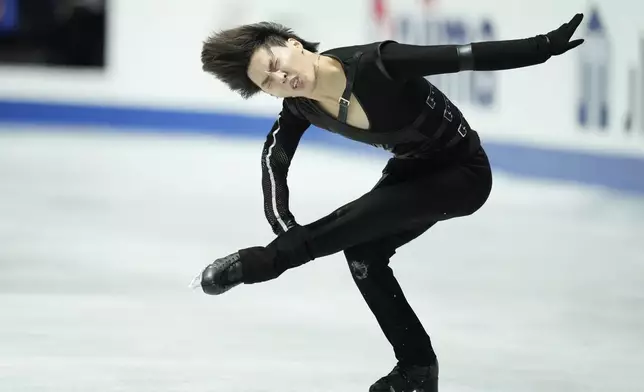 Kao Miura of Japan competes in the men's short program at the Grand Prix of Figure Skating series competition in Tokyo, Japan, Friday, Nov. 8, 2024. (AP Photo/Hiro Komae)