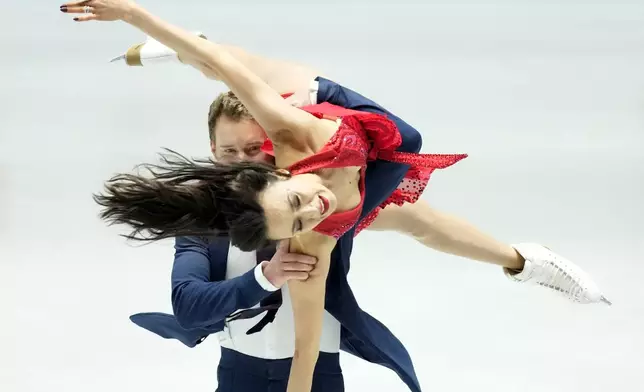 Madison Chock and Evan Bates of the U.S. compete in the ice dance rhythm dance program at the Grand Prix of Figure Skating series competition in Tokyo, Japan, Friday, Nov. 8, 2024. (AP Photo/Hiro Komae)