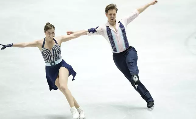 Christina Carreira and Anthony Ponomarenko of the U.S. compete in the ice dance rhythm dance program at the Grand Prix of Figure Skating series competition in Tokyo, Japan, Friday, Nov. 8, 2024. (AP Photo/Hiro Komae)