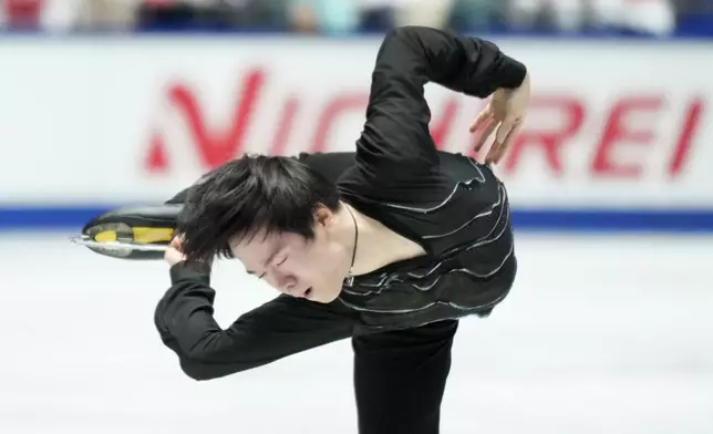 Yuma Kagiyama of Japan competes in the men's short program at the Grand Prix of Figure Skating series competition in Tokyo, Japan, Friday, Nov. 8, 2024. (AP Photo/Hiro Komae)