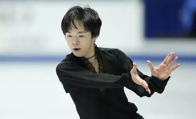 Yuma Kagiyama of Japan competes in the men's free skating at the Grand Prix of Figure Skating series competition in Tokyo, Saturday, Nov. 9, 2024. (AP Photo/Hiro Komae)