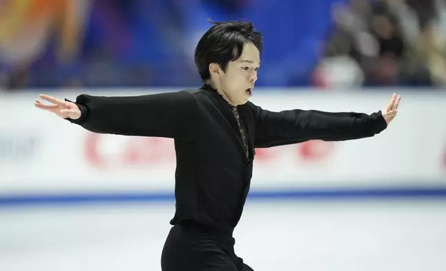 Yuma Kagiyama of Japan competes in the men's free skating at the Grand Prix of Figure Skating series competition in Tokyo, Saturday, Nov. 9, 2024. (AP Photo/Hiro Komae)