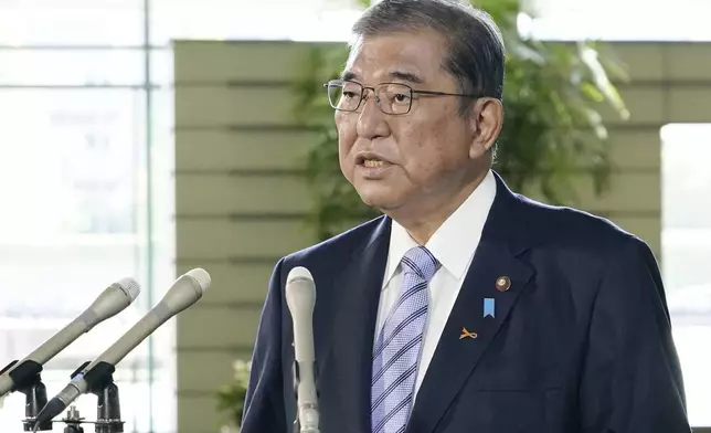 Japan's Prime Minister Shigeru Ishiba speaks to journalists following North Korea's latest missile launches, at his office in Tokyo Tuesday, Nov. 5, 2024. (Kyodo News via AP)