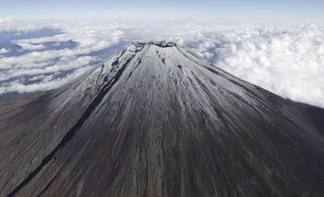 Mt. Fuji in Japan is covered with snow Wednesday, Nov. 6, 2024. (Kyodo News via AP)